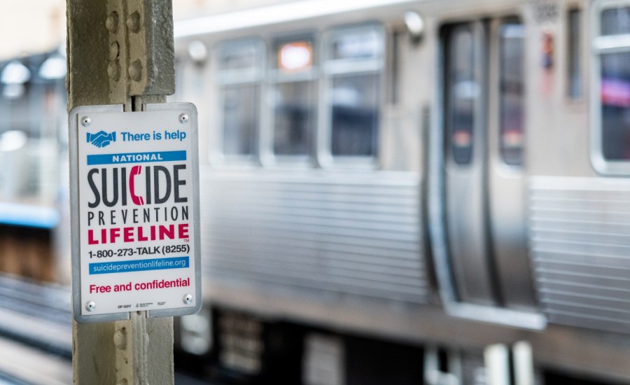 a sign with information for the national suicide prevention lifeline