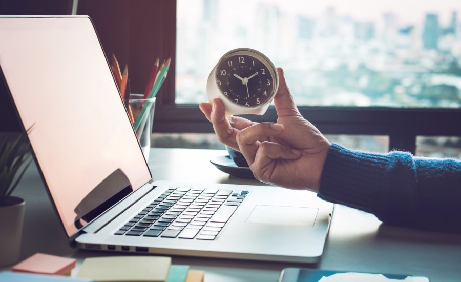 laptop and clock