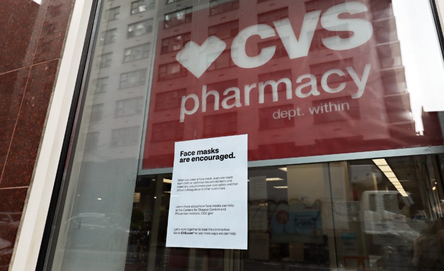 coronavirus COVID-19 community spread CVS pharmacy drive trhu testing sites location new 1.5 million per month new Reuters Abbott