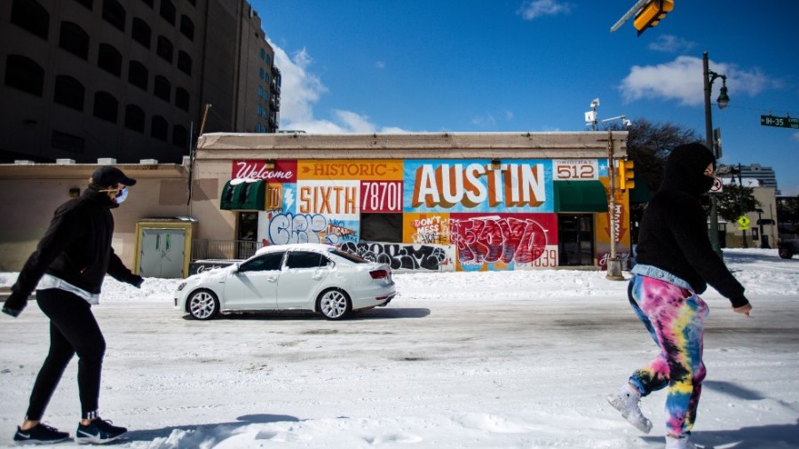 Residents in Austin, Texas walk amid bitter cold