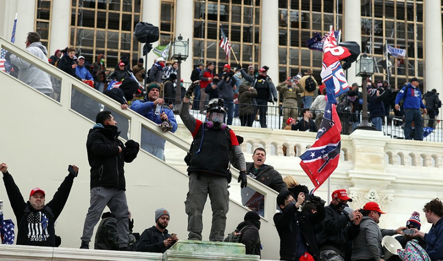 Supporters of then-President Trump storm the Capitol on Jan. 6