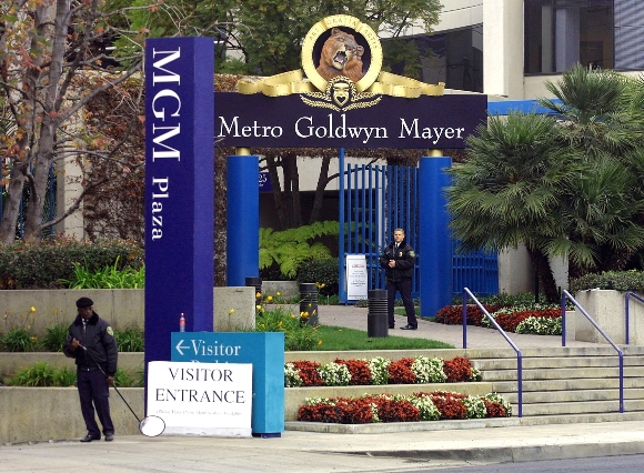 Security personnel stand outside the Santa Monica-based headquarters of Metro-Goldwyn-Mayer studio