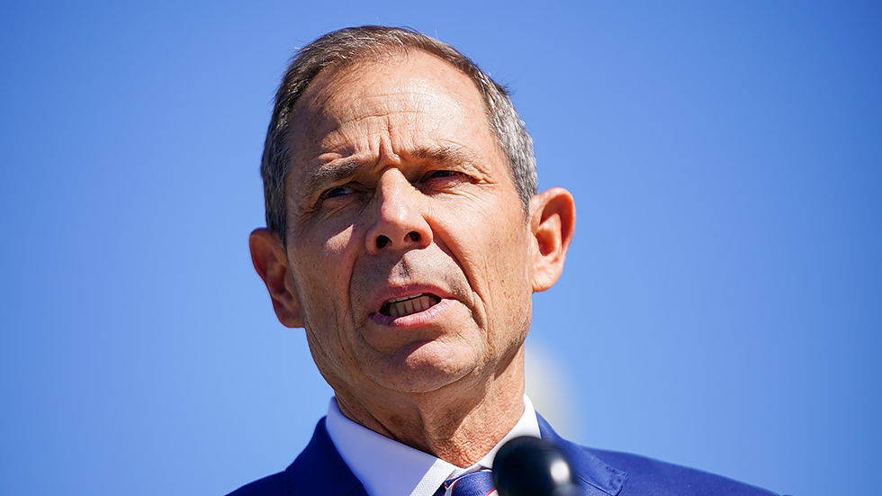 Rep. John Curtis (R-Utah) addresses reporters during a press conference on June 23, 2021 to introduce the Conservative Climate Caucus