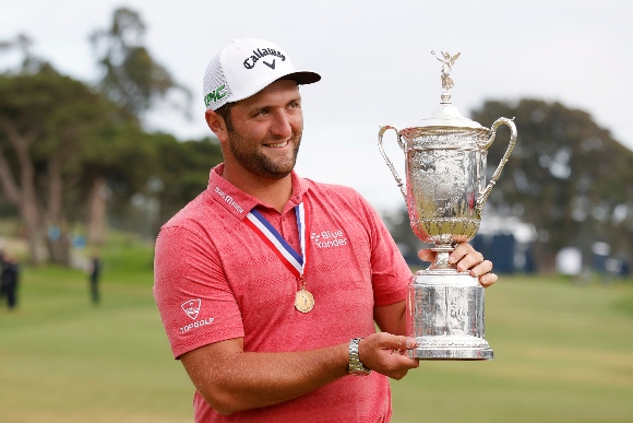 Jon Rahm of Spain celebrates with the trophy after winning during the final round of the 2021 U.S. Open