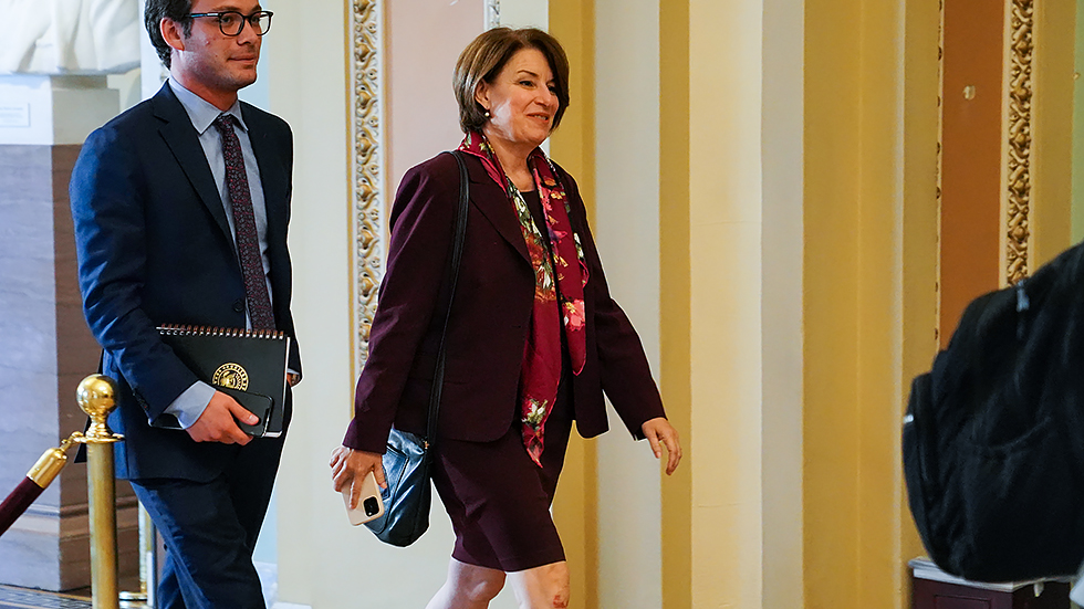 Sen. Amy Klobuchar (D-Minn.) arrives for the weekly Senate Democratic policy luncheon on July 13