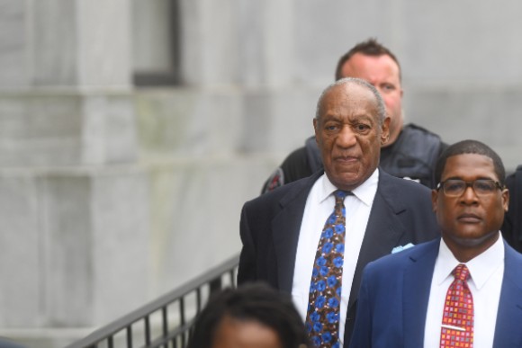 Bill Cosby leaves