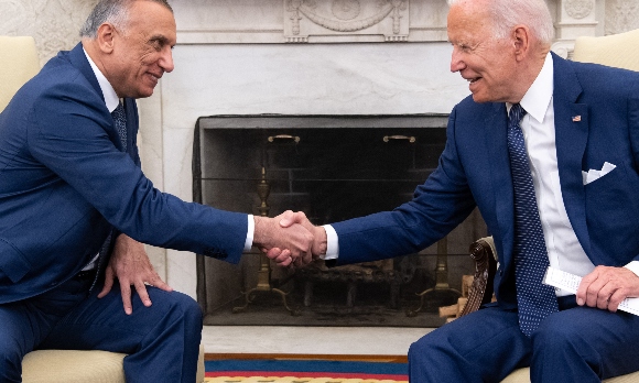 US President Joe Biden shakes hands with Iraqi Prime Minister Mustafa Al-Kadhimi