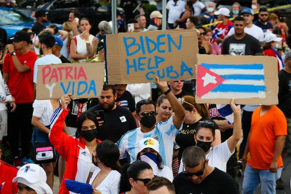 People demonstrate during a protest against the Cuban government in Miami 