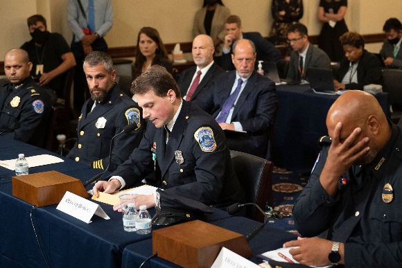 US Capitol Police officer Sgt. Aquilino Gonell, DC Metropolitan Police Department officer Michael Fanone, DC Metropolitan Police Department officer Daniel Hodges and US Capitol Police officer Harry Dunn testify