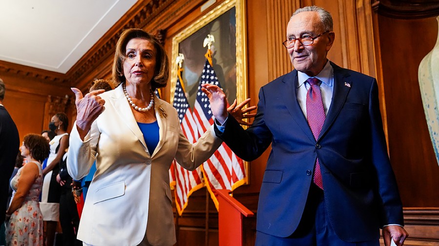 Majority Leader Charles Schumer (D-N.Y.) speaks to Speaker Nancy Pelosi (D-Calif.) during a press event on Tuesday, July 20, 2021 to discuss President Biden’s Child Tax Credit.