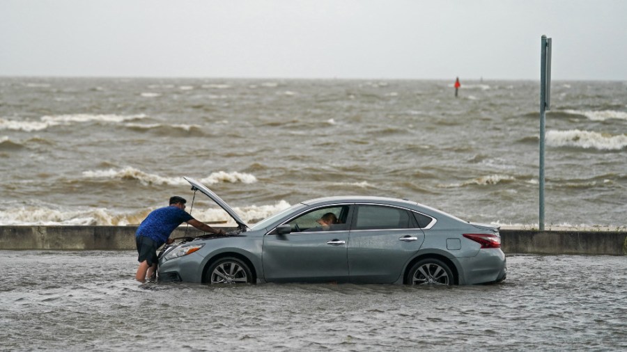 A car is stranded in the flooding after Hurricane Ida