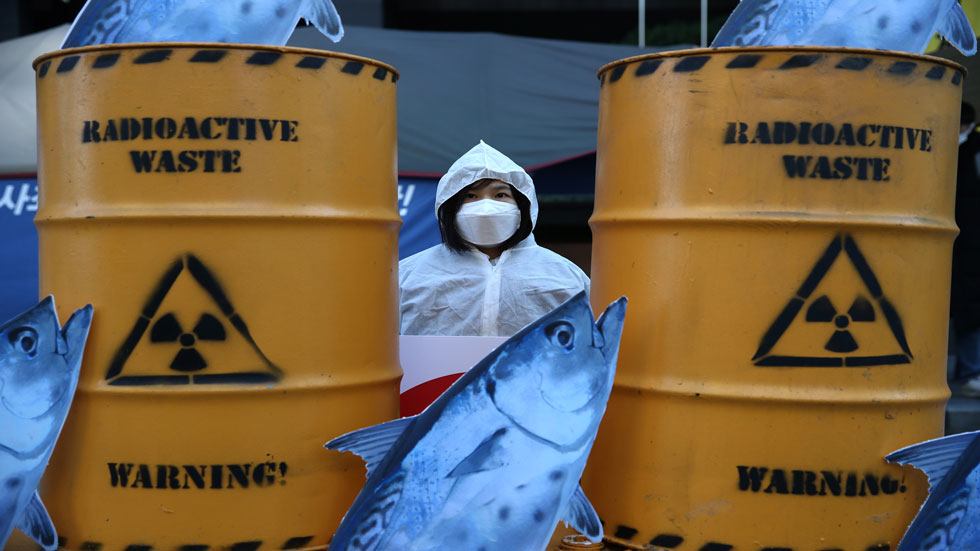 A person protesting the removal of radioactive waster at Fukishima