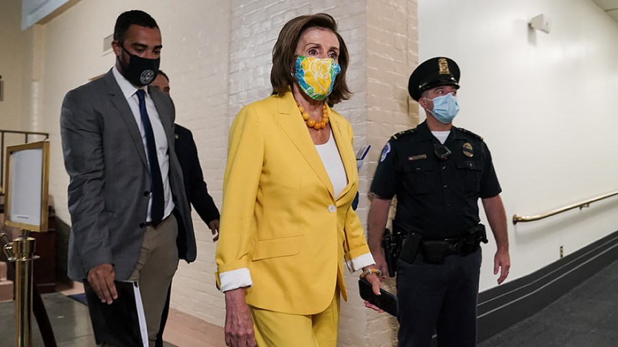 Speaker Nancy Pelosi (D-Calif.) leaves a House Democratic Caucus meeting on Tuesday, August 24, 2021 where they mostly discussed the John Lewis Voting Rights Advancement Act.