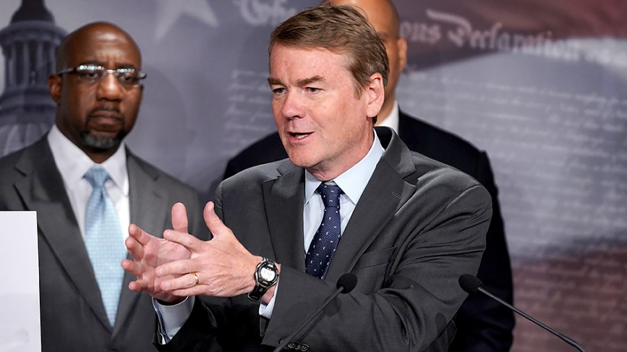 Sen. Michael Bennet (D-Colo.) addresses reporters during a press conference on Thursday, July 15, 2021 to discuss the Child Tax Credit payments being sent out.