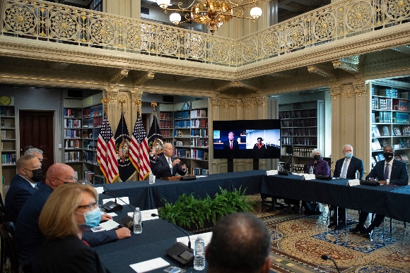 President Joe Biden (C) speaks during a meeting with business leaders and CEOs on the Covid-19 response