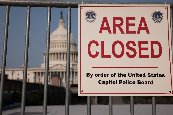 An "Area Closed" sign blocks the stairway to the U.S. Capitol Visitor Center