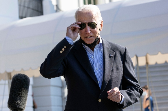 President Joe Biden departs the White House