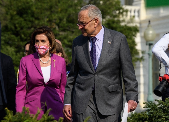 US House Speaker Nancy Pelosi(D-CA) and Senate Majority Leader Chuck Schumer(D-NY) arrive at a press conference