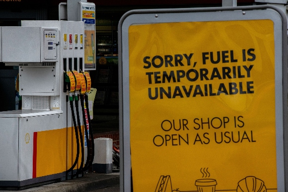 Out of service signs on fuel pumps at a Shell garage in London