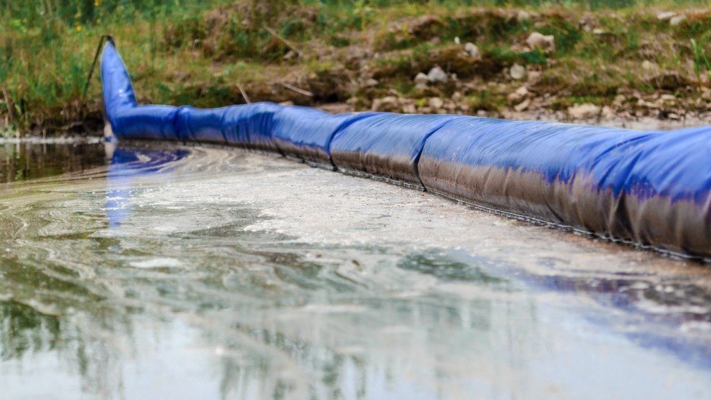 a barrier keeps oil in place