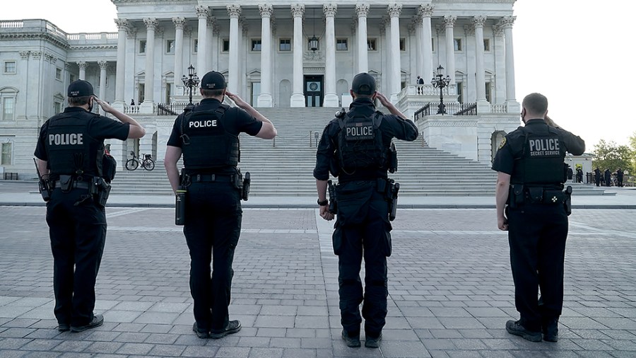 U.S. Secret Service Police members are seen on the East Front Plaza as the body of U.S. Capitol Police officer William Evans leaves the Capitol after lying in honor in the Rotunda on Tuesday, April 13, 2021.