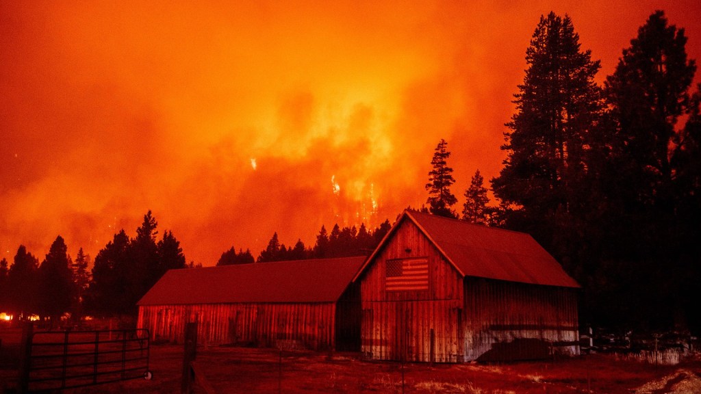 The Caldor Fire in Lake Tahoe behind a barn