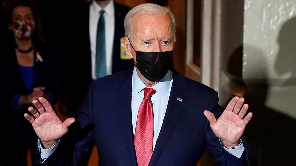 President Biden speaks to reporters after a Democratic Caucus meeting at the Capitol to discuss the bipartisan infrastructure plan on Friday, October 1, 2021.