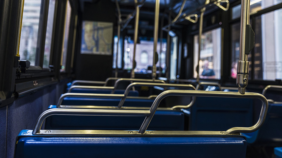 Empty bus with blue seating area