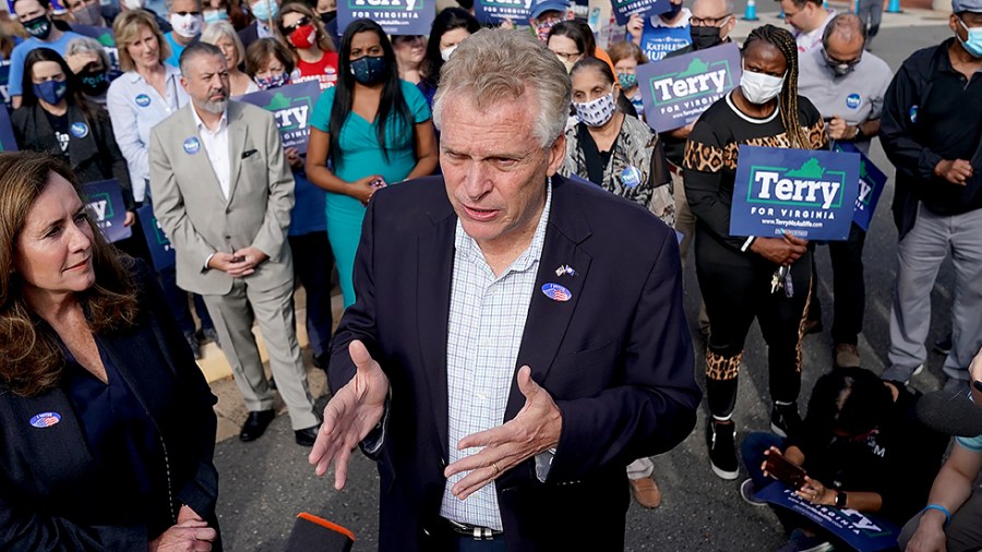 Virginia Democratic gubernatorial candidate Terry McAuliffe addresses reporters after casting his ballot during early voting at the Fairfax County Government Center in Fairfax, Va., on Wednesday, October 13, 2021.