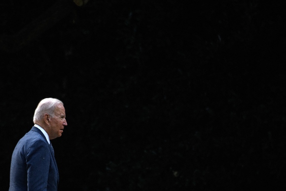 US President Joe Biden walks to the Oval Office 