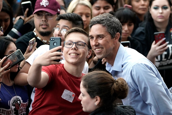 Democratic presidential candidate and former Texas congressman Beto O'Rourke, right, poses for a photograph with a supporter