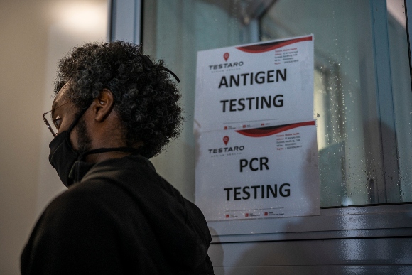 A person queues to be tested for COVID-19 in Johannesburg, South Africa