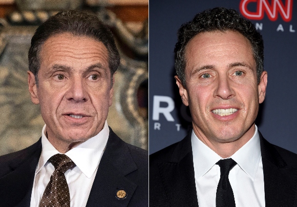 Former New York Gov. Andrew M. Cuomo, left, and CNN anchor Chris Cuomo, right