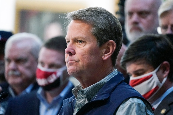 Georgia Gov. Brian Kemp speaks during a news conference at the State Capitol in Atlanta