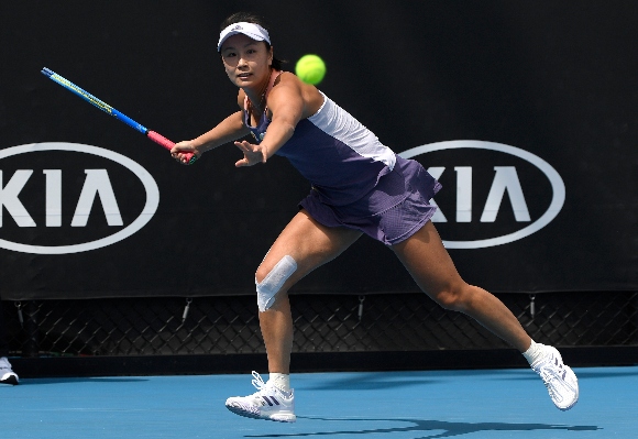 China's Peng Shuai makes a forehand return