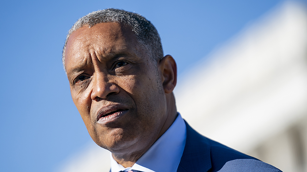 Washington, D.C., Attorney General Karl Racine addresses reporters during a press conference on Tuesday, December 14, 2021 to announce a new lawsuit against far-right groups involved with the Jan. 6 attack on the Capitol.