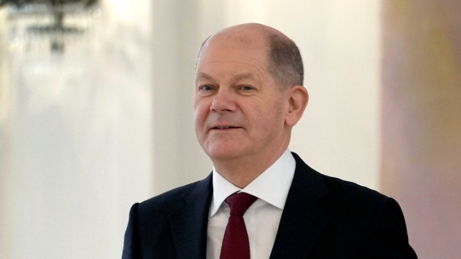 New elected German Chancellor Olaf Scholz holds his letter of appointment