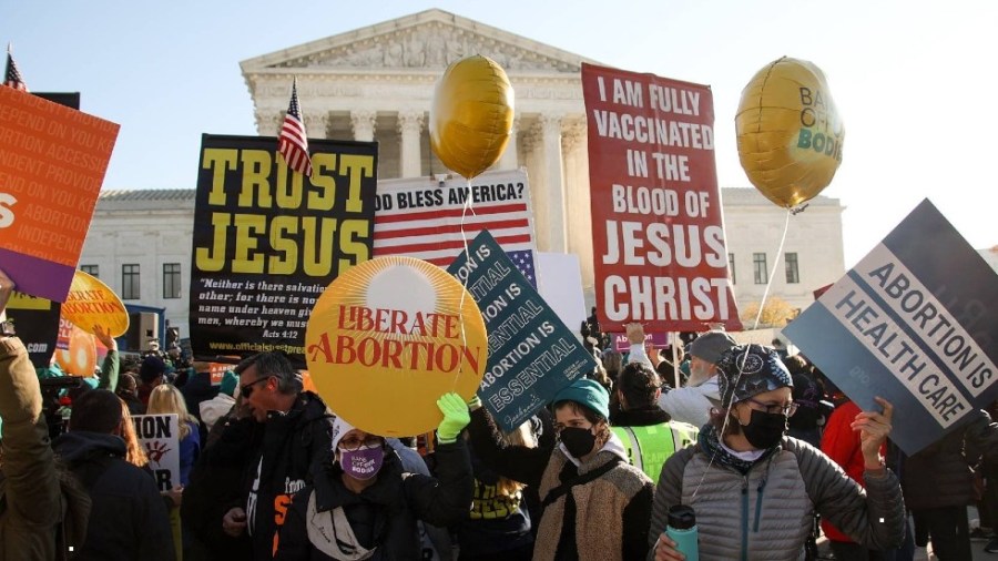 Protesters outside Supreme Court as justices hear arguments in high-profile abortion case