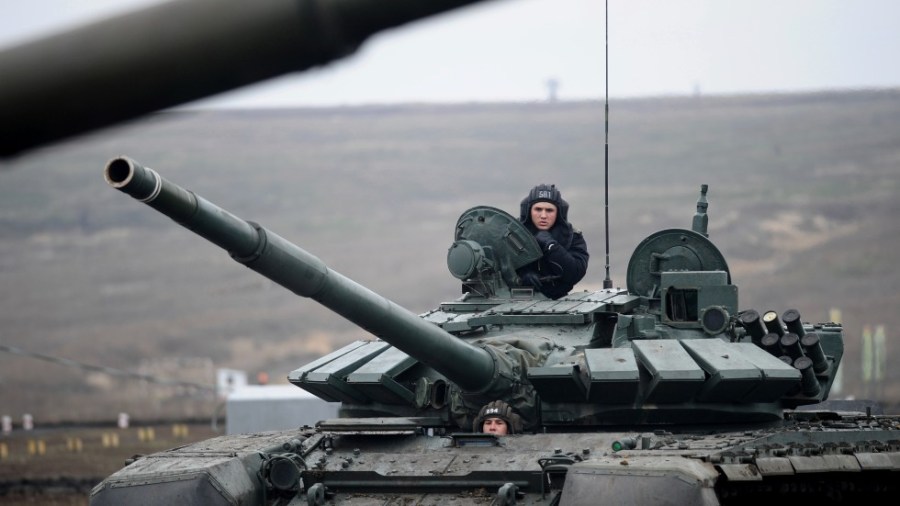 Russian troops take part in drills at the Kadamovskiy firing range in the Rostov region in southern Russia, Dec. 14, 2021.