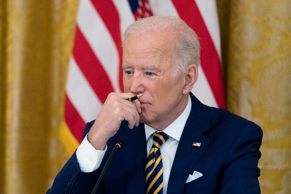 President Joe Biden listens during a meeting with the National Governors Association