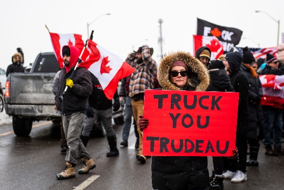 Protestors show their support for the Freedom Convoy of truck drivers who are making their way to Ottawa