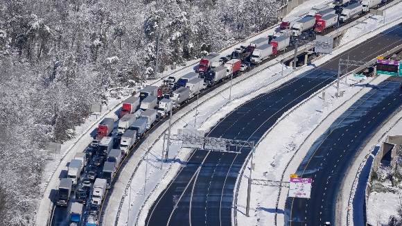 Cars and trucks are stranded on sections of Interstate 95