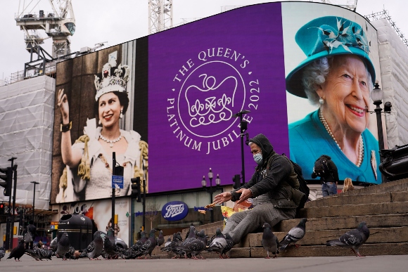 The screen in Piccadilly Circus is lit to celebrate the 70th anniversary of Britain's Queen Elizabeth's accession to the throne