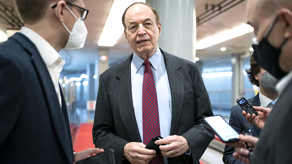 Sen. Richard Shelby (R-Ala.) speaks to reporters in the basement of the Capitol on his way to a votes regarding judicial nominations on Wednesday, February 2, 2022.