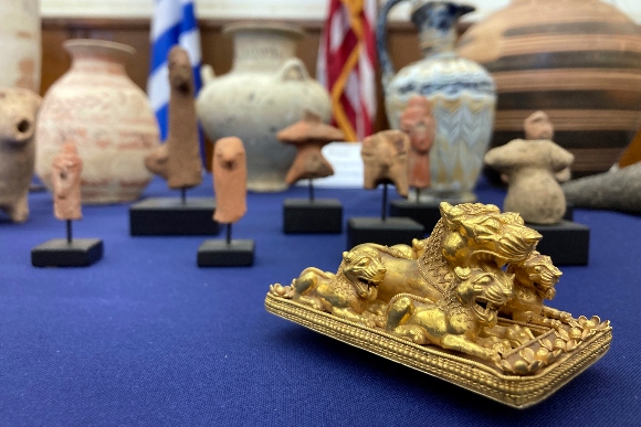 Stolen antiquities are displayed at a news conference at the offices of the Manhattan District Attorney Alvin Bragg