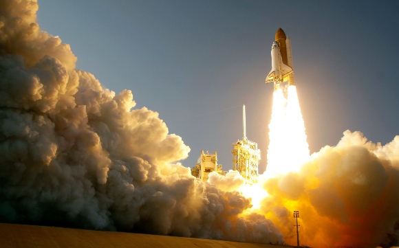 Space shuttle Discovery lifts off from Pad 39A at the Kennedy Space Center