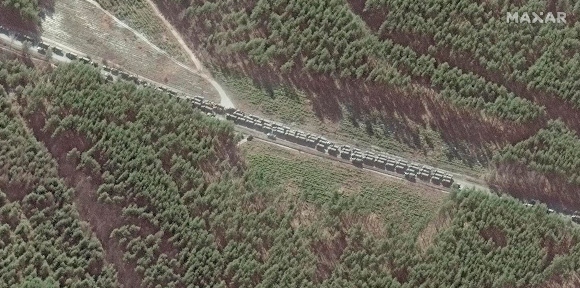 This satellite image provided by Maxar Technologies shows the northern end of a convoy at the southeast of Ivankiv