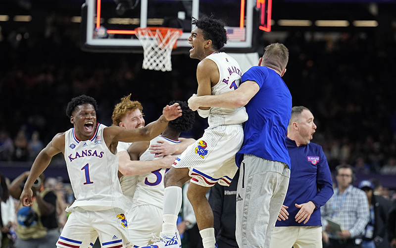 Remy Martin celebrates with teammates