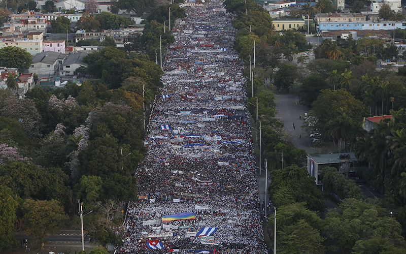 An aerial view shows thousands filing through an avenue during a May Day march to Revolution Square in Havana