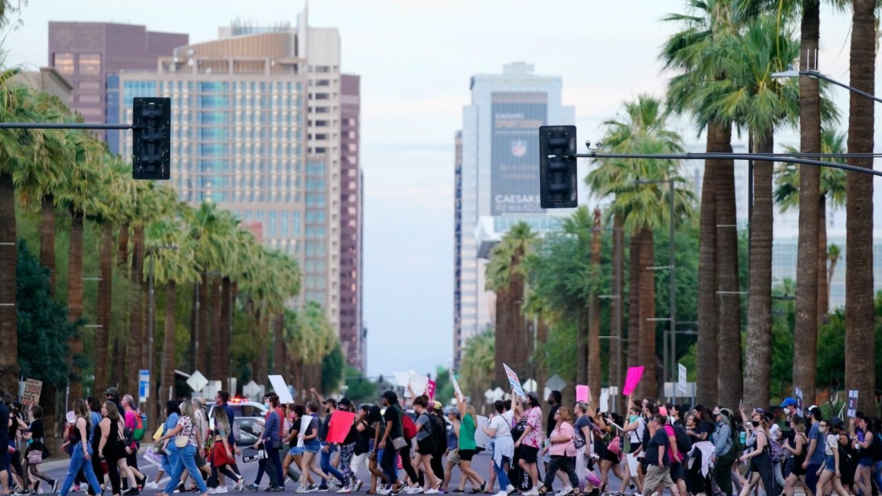 Protestors in Phoenix, Arizona line the streets after the Supreme Court overturned Roe v. Wade on June 24, 2022.